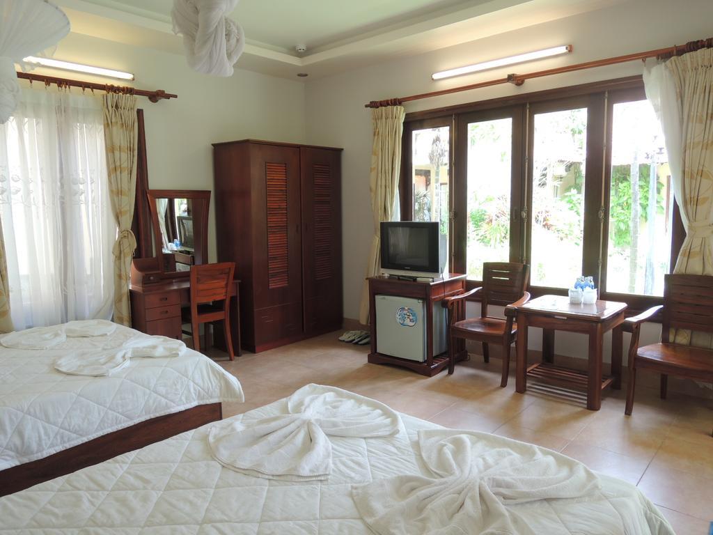 Ngoc Bich Bungalow Hotel Phan Thiet Ruang foto