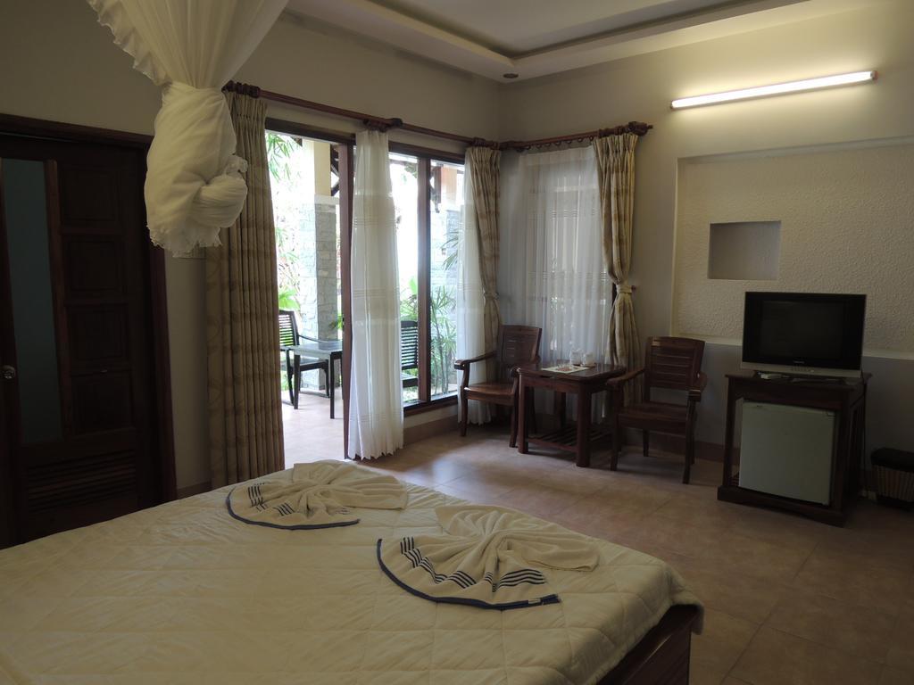 Ngoc Bich Bungalow Hotel Phan Thiet Ruang foto